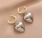 Shein Pendientes de aro de acero inoxidable con corazón de metal para mujer - Quierox - Tienda Online