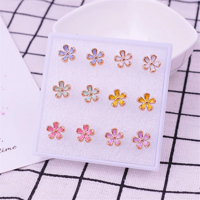 Conjunto de pendientes de plástico con forma de flor de cerezo para mujer - Quierox - Tienda Online